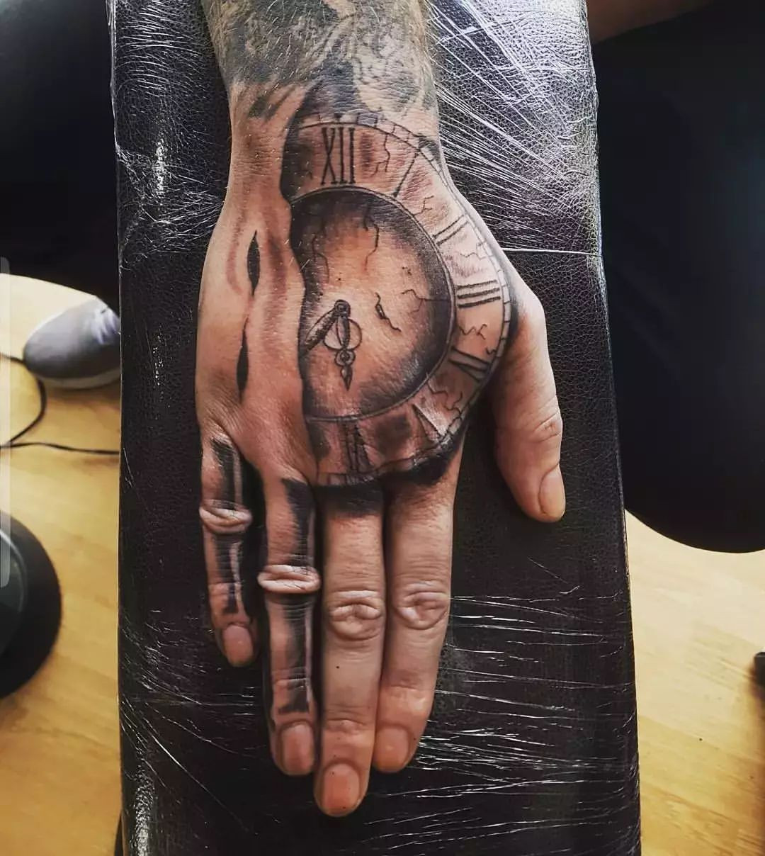 clock skeleton hand tattoo
