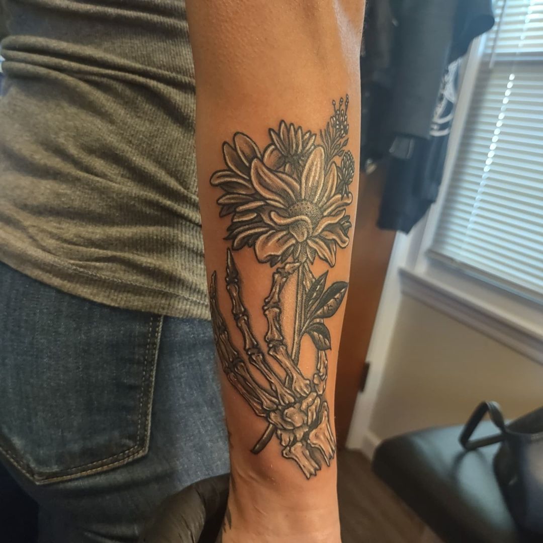 female skeleton hand tattoo